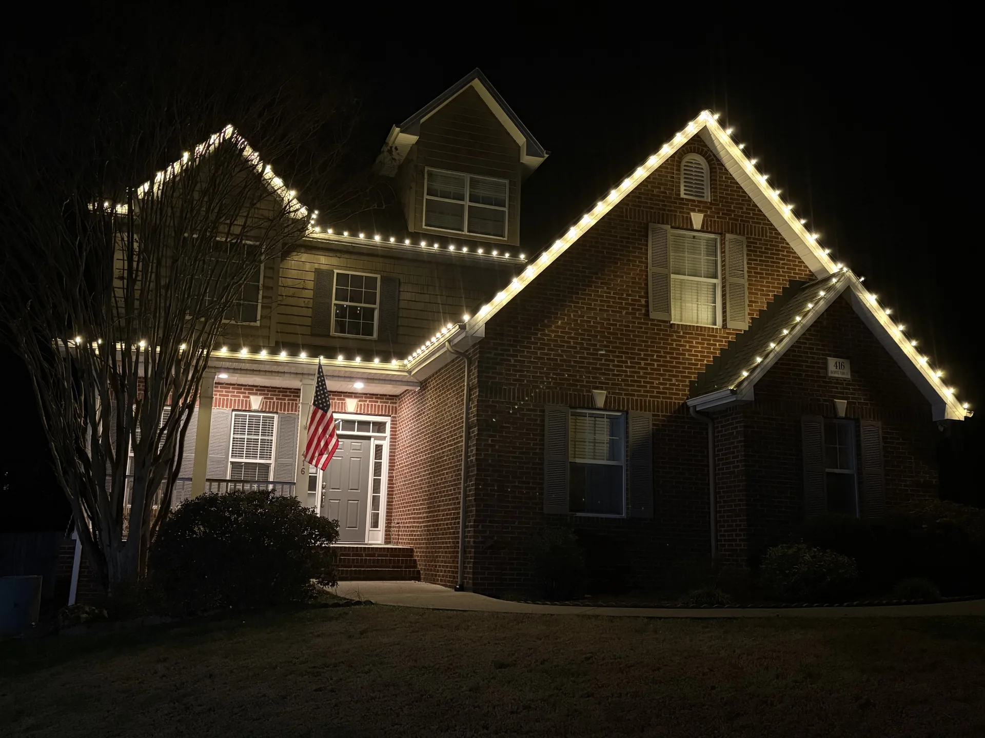 A Knoxville-area home with warm white holiday lighting installed by Rocky Top Holiday Lighting